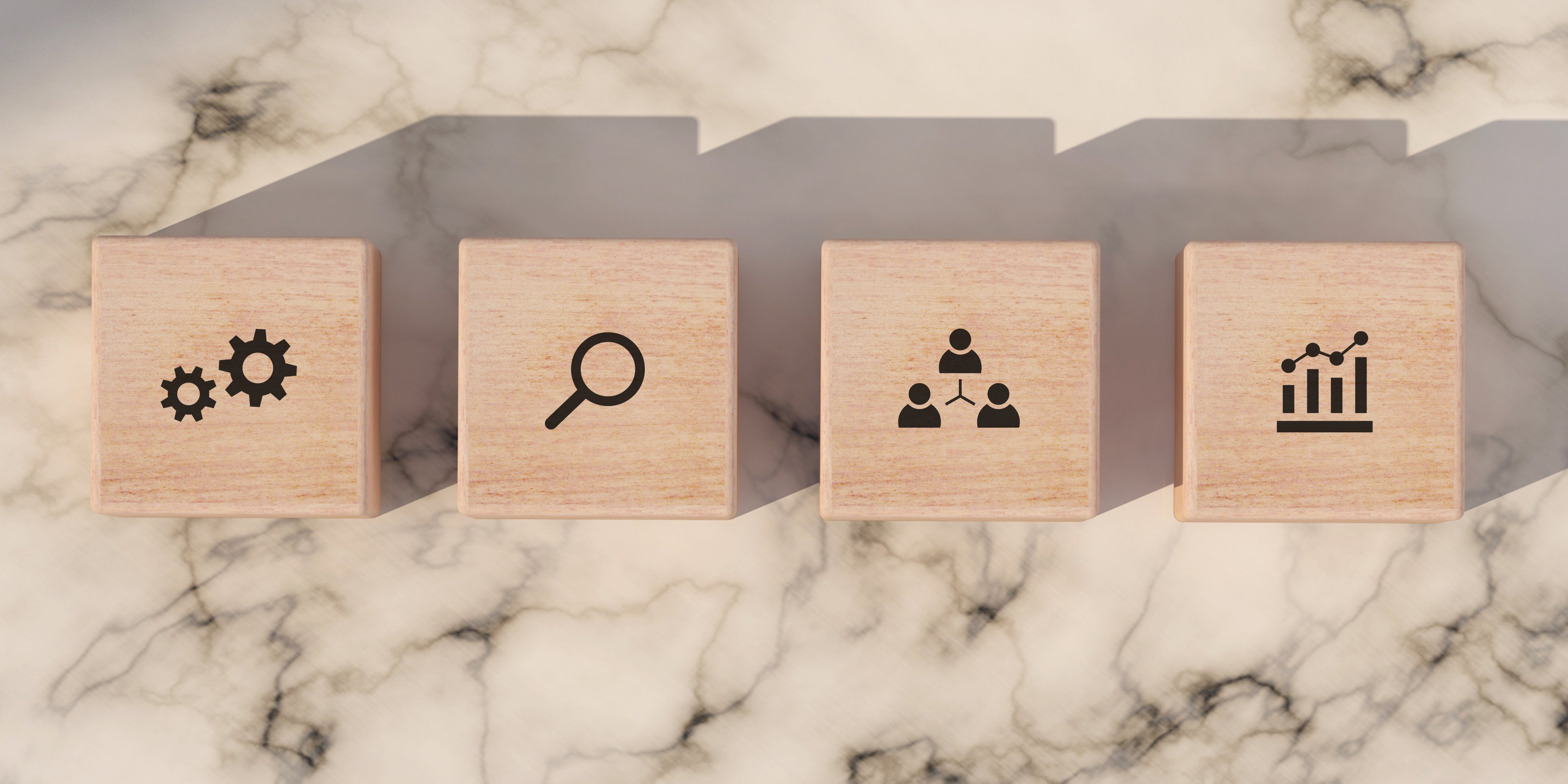 conceptual business illustration with wooden blocks icons marble background